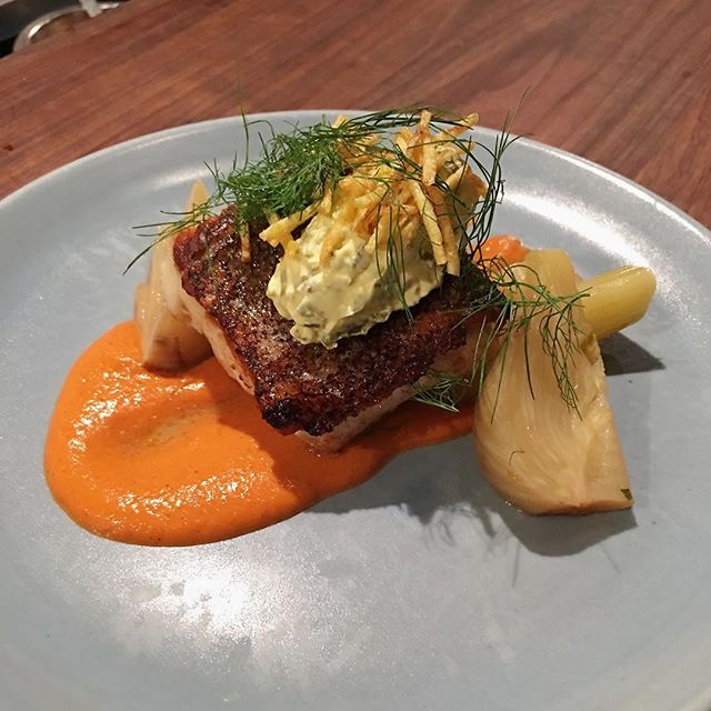 Pan-Roasted Cod with a charred red pepper sauce, pickled fennel & smoked jalapeño saffron yogurt